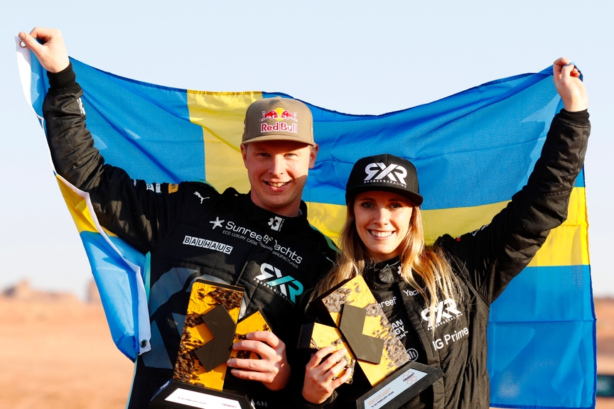FEBRUARY 20: Johan Kristoffersson (SWE), Rosberg X Racing, and Mikaela Ahlin-Kottulinsky (SWE), Rosberg X Racing, 1st position, with their trophies and the Swedish flag during the Saudi Arabia on February 20, 2022. (Photo by Alastair Staley / LAT Images)