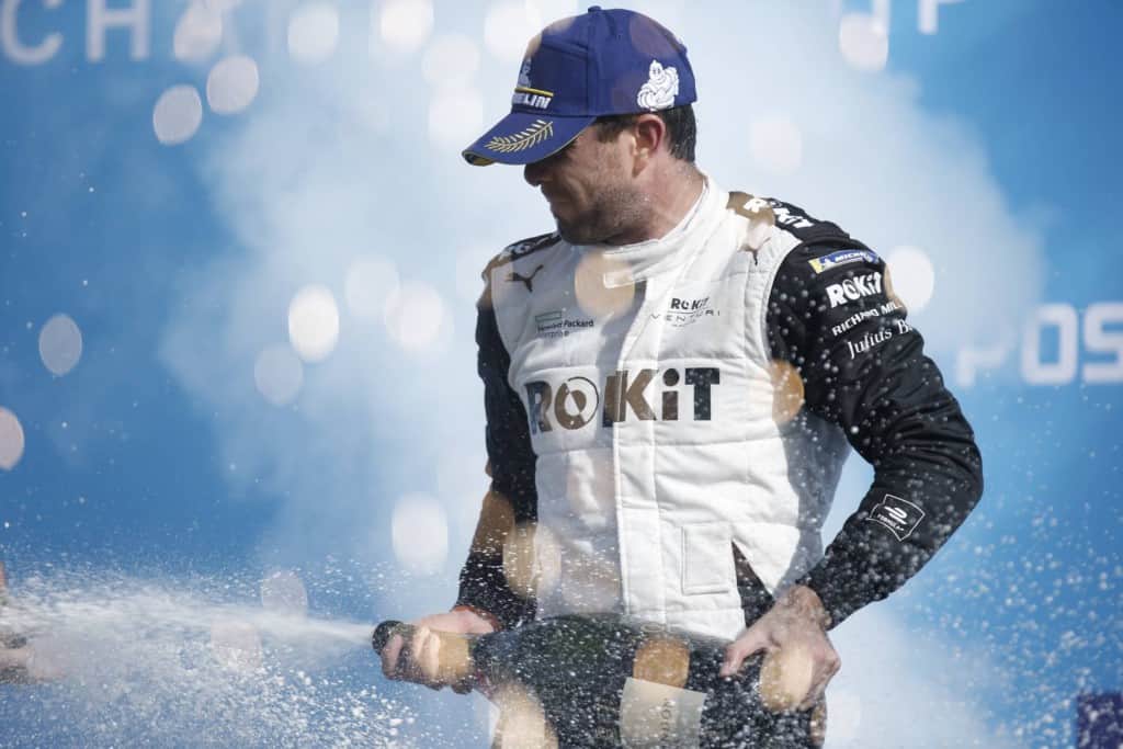 BERLIN TEMPELHOF AIRPORT, GERMANY - AUGUST 15: Norman Nato (FRA), Venturi Racing, 1st position, sprays the victory Champagne on the podium during the Berlin E-Prix II at Berlin Tempelhof Airport on Sunday August 15, 2021 in Berlin, Germany. (Photo by Andrew Ferraro / LAT Images)